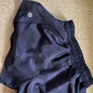 Black camo lululemon hotty hot shorts. Size 2, 2 inch inseam.